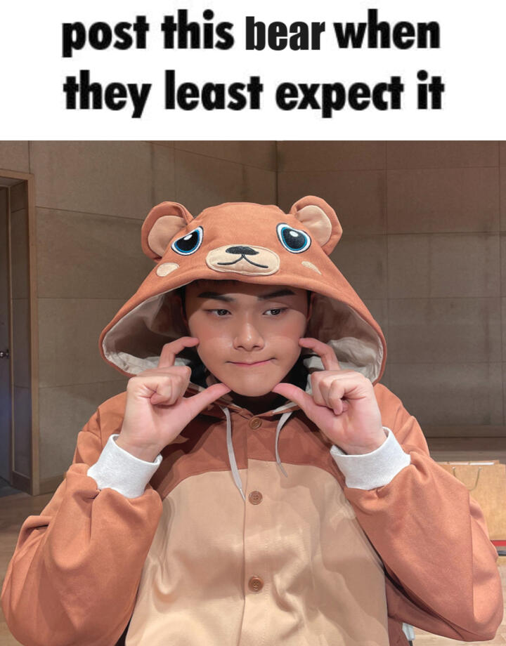 Jahan in a bear onesie captured "Post this bear when they least expect it"